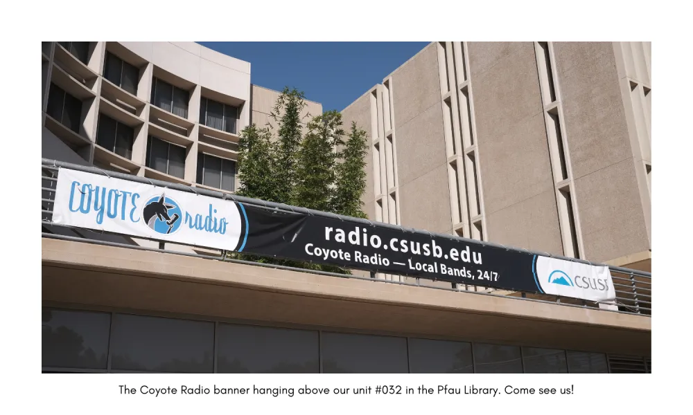 Coyote Radio banner in front of Pfau Library